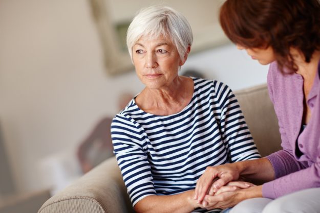 Worried about the future. Shot of a woman sitting beside her elderly mother at home. 4 Tips To Tell Family Members Your Aging Parents Need Assisted Living