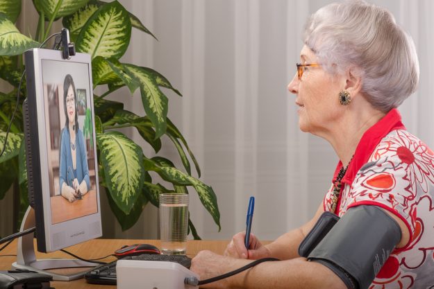 Measuring pressure during virtual doctor visit How Senior Living In Lakewood, TX Makes Telehealth Work For Residents