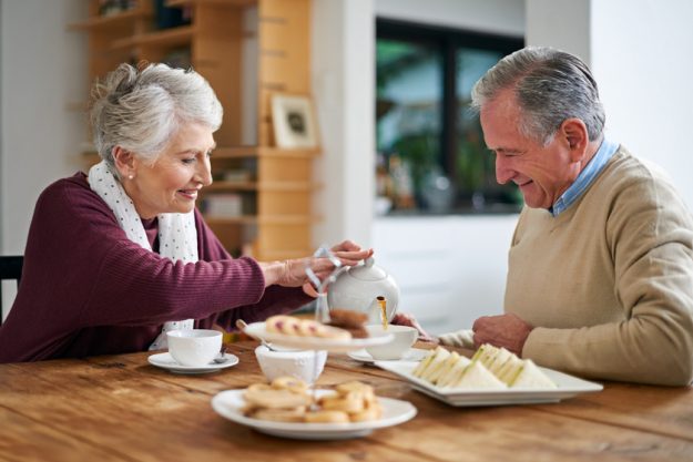 Youre my cup of tea, love. Cropped shot of a senior couple having lunch at home. How An Assisted Living Facility In Park Cities, TX Increases Seniors' Satisfaction