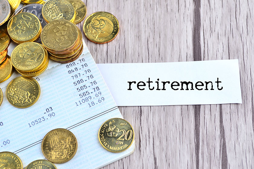 Coins and silver pen on bank account book with Coins and silver pen on bank account book with