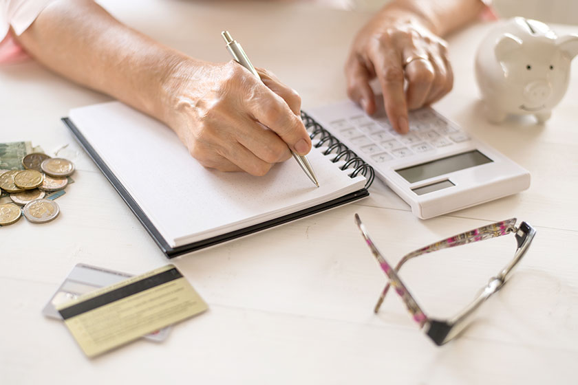 Elderly womens hands count expenses Elderly womens hands count expenses