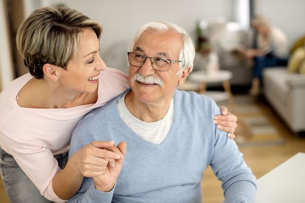 Happy woman and her senior father