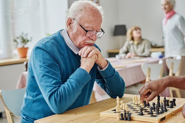 Pensive senior man in eyeglasses concentrating Pensive senior man in eyeglasses concentrating