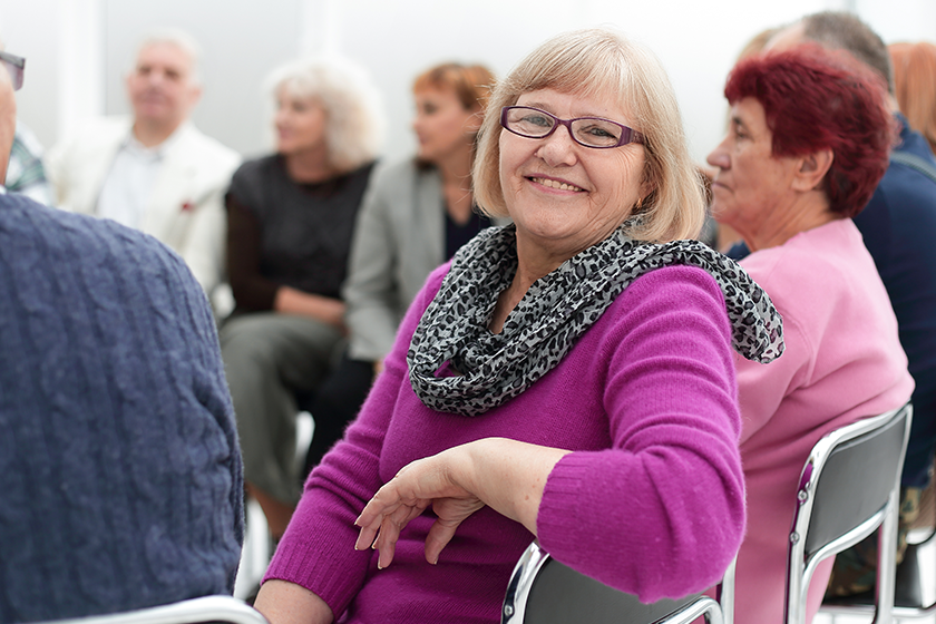 Motivated diverse business team in a meeting posing in front Motivated diverse business team in a meeting posing in front