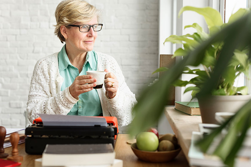 Senior Adult Using Typerwriter