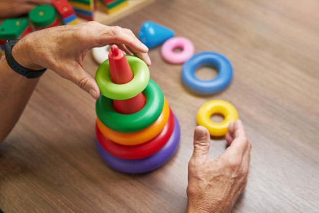 Mature-man-recovering-motor-skills-in-clinic