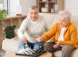 senior-female-friends-playing-chess