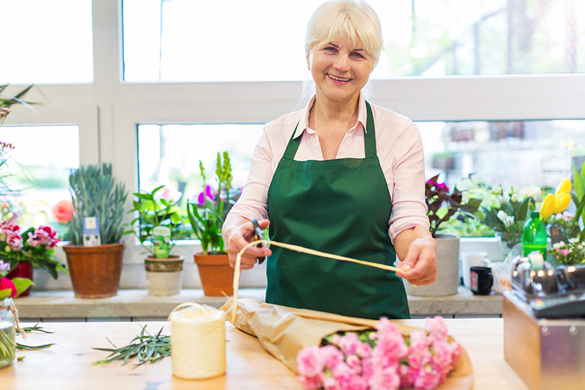 woman-working-in-florist-shop woman-working-in-florist-shop