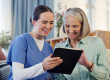 Consultation, nurse and senior woman with tablet