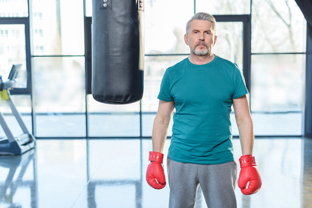 senior-sportsman-in-boxing-gloves senior-sportsman-in-boxing-gloves