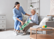 Senior woman training with stretching band