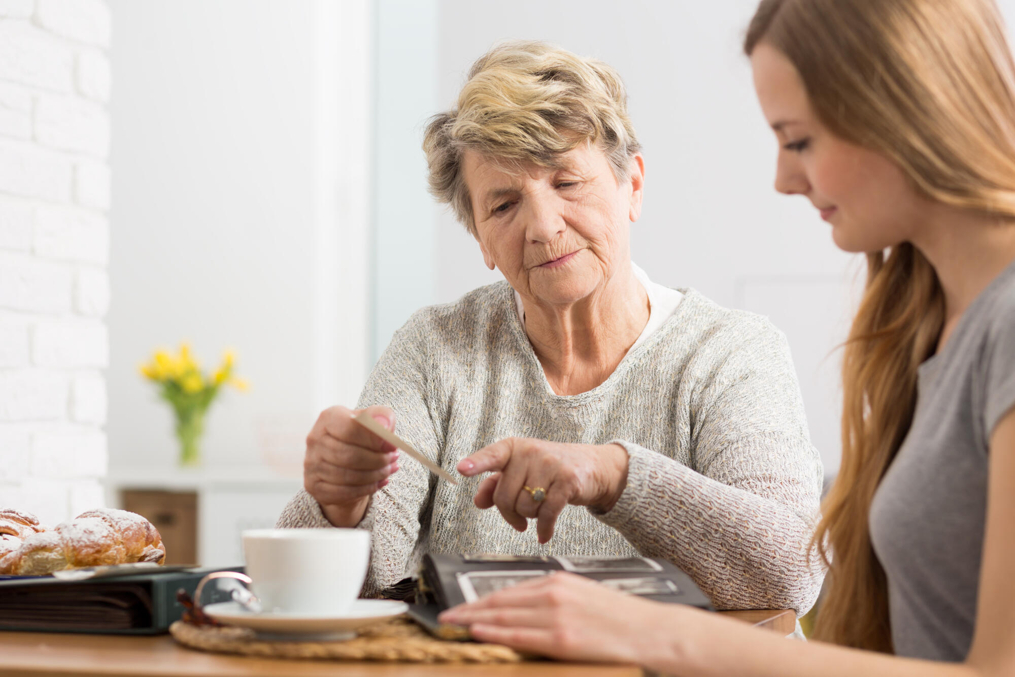 Portrait,Of,An,Elderly,Lady,Having,Coffee,With,Her,Granddaughter